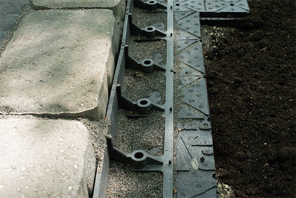 Close up photo of paver edge restraint